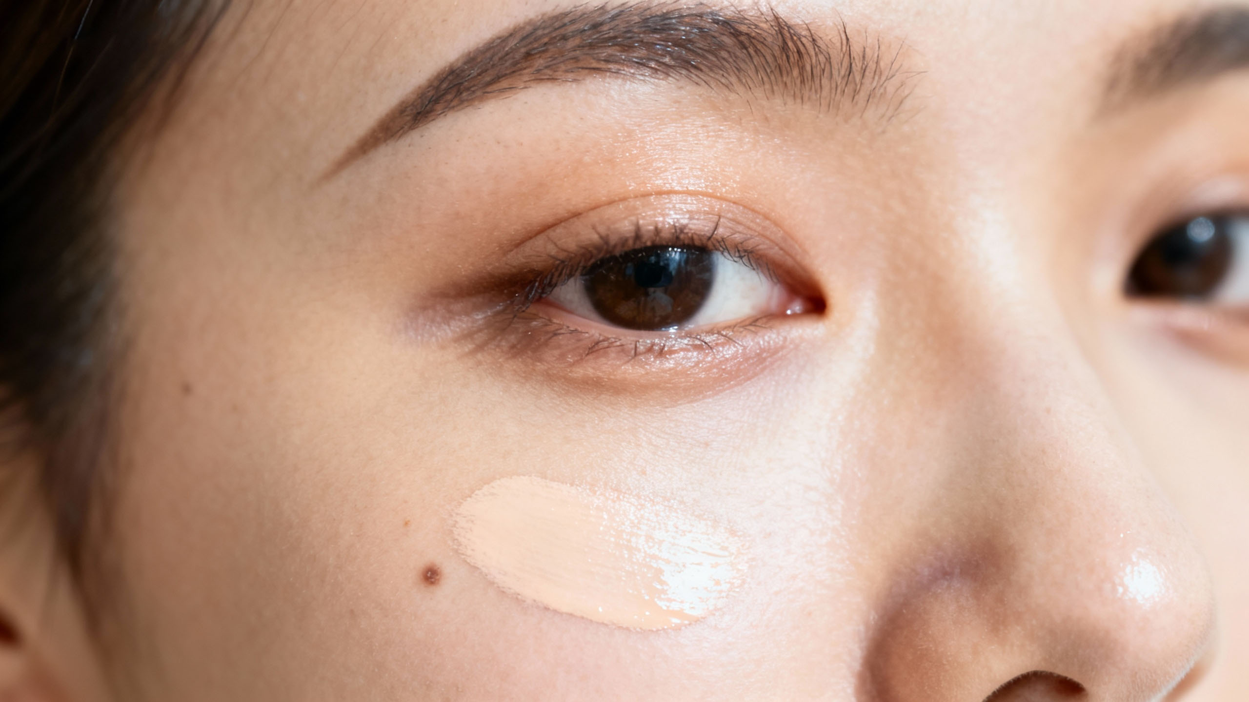 Applying concealer on combination skin