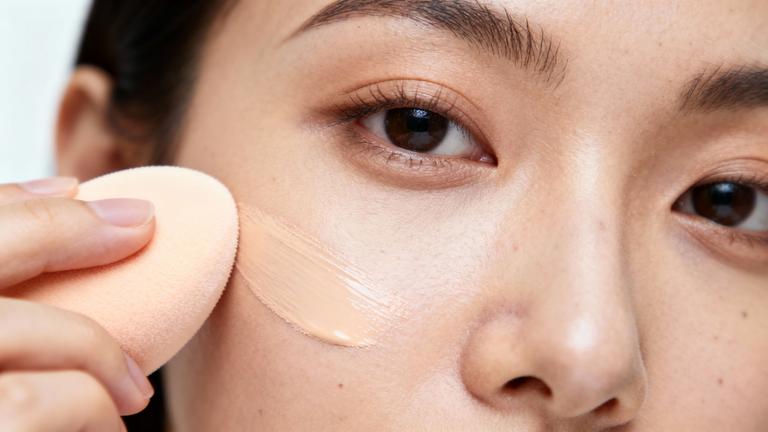 Applying foundation in thin layers for long wear